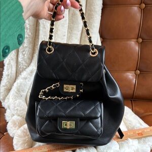 Black quilted mini backpack